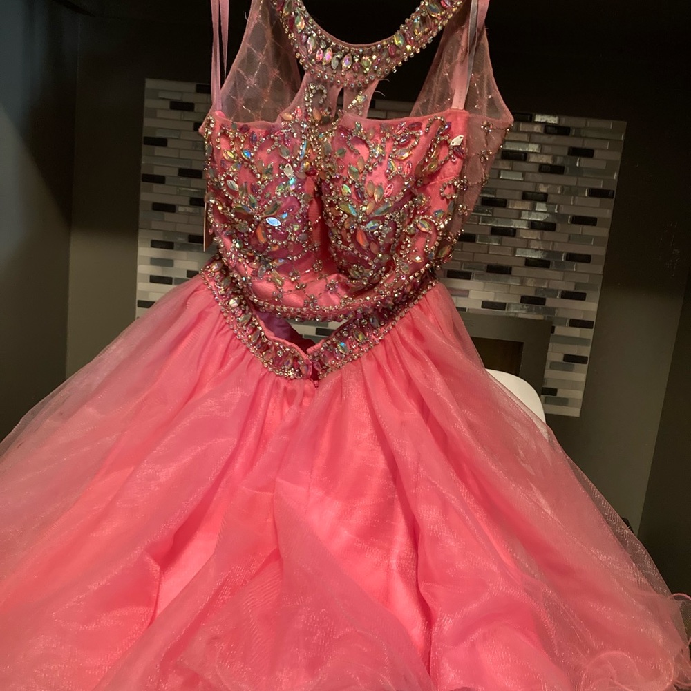 Never worn , some bead work that needs fixed . Shown in pictures. Asking $120
